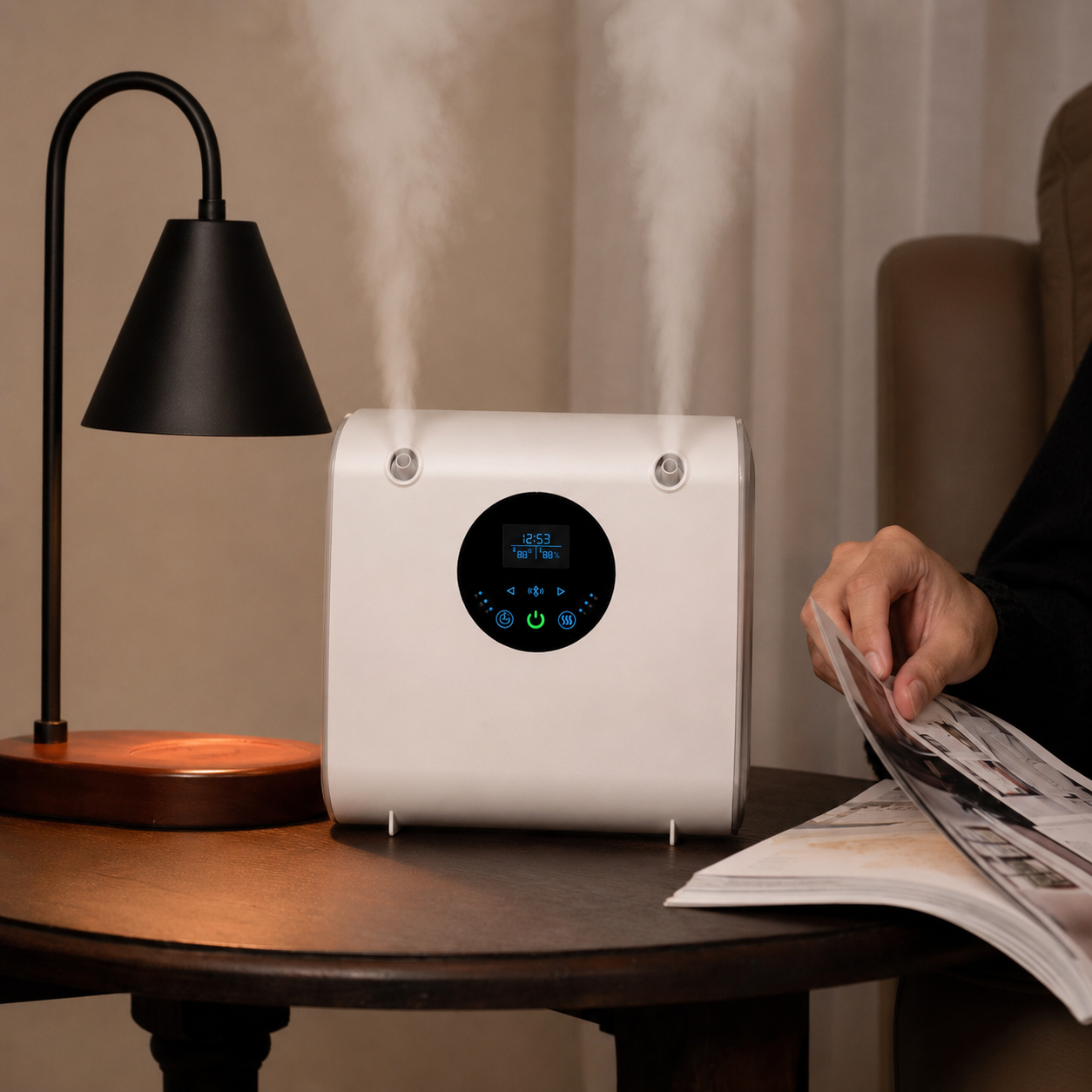 White G'Five dual-head aroma diffuser on a side table
